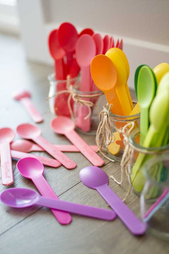 colorful spoons in jars
