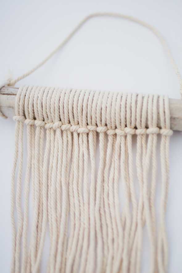 macrame rope hanging from a stick