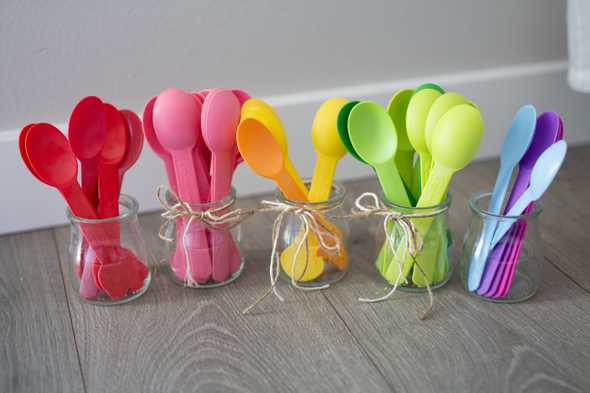 colorful spoons in jars