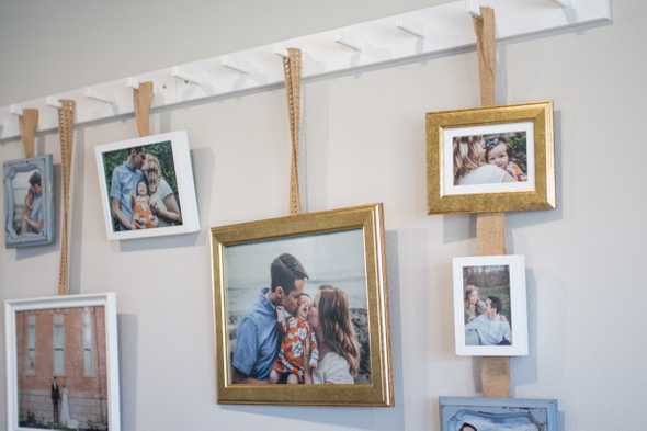 Close shot of picture frames hanging on the wall